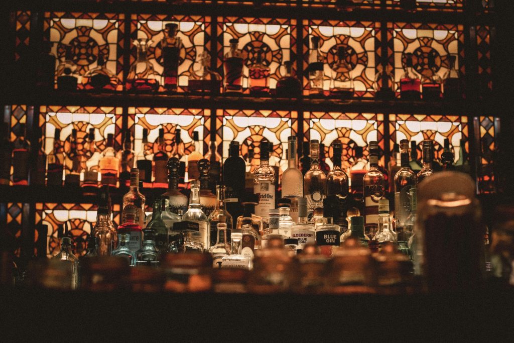 Bar shelves with bottles in a Vienna pub