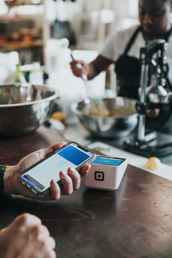 Contactless payment at a café counter in Vienna