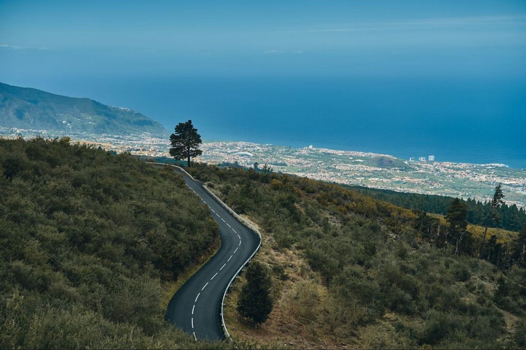 Winding mountain road overlooking Spanish coastline
