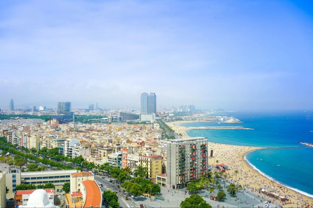 Aerial view of Barcelona coastline and city skyline