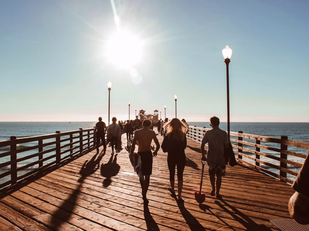 People walking on an ocean pier in San Diego